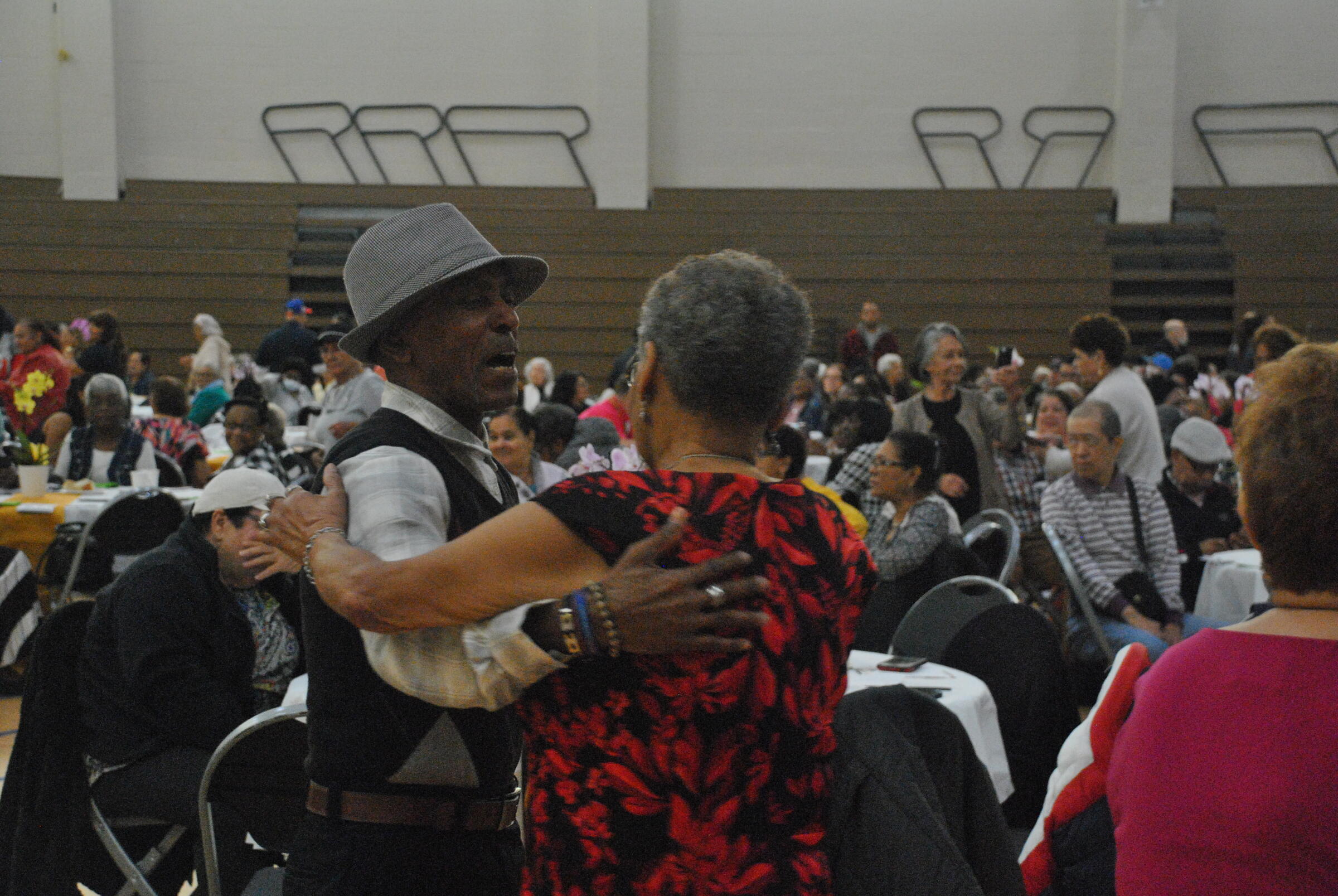 Attendees dancing at Hispanic Heritage Luncheon