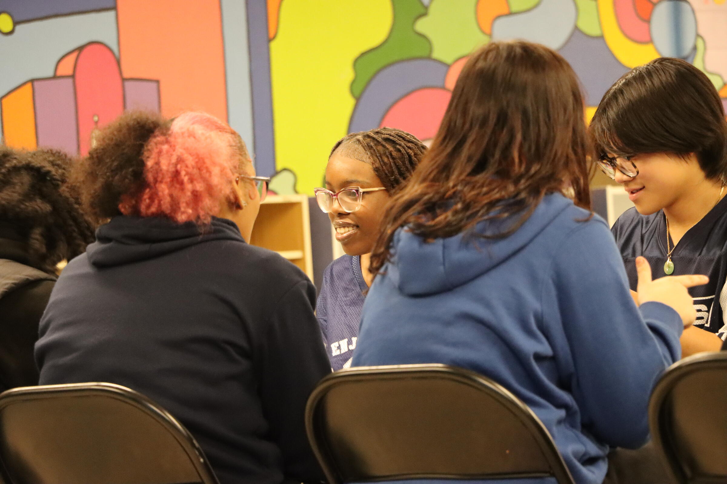 MYC members sitting and chatting