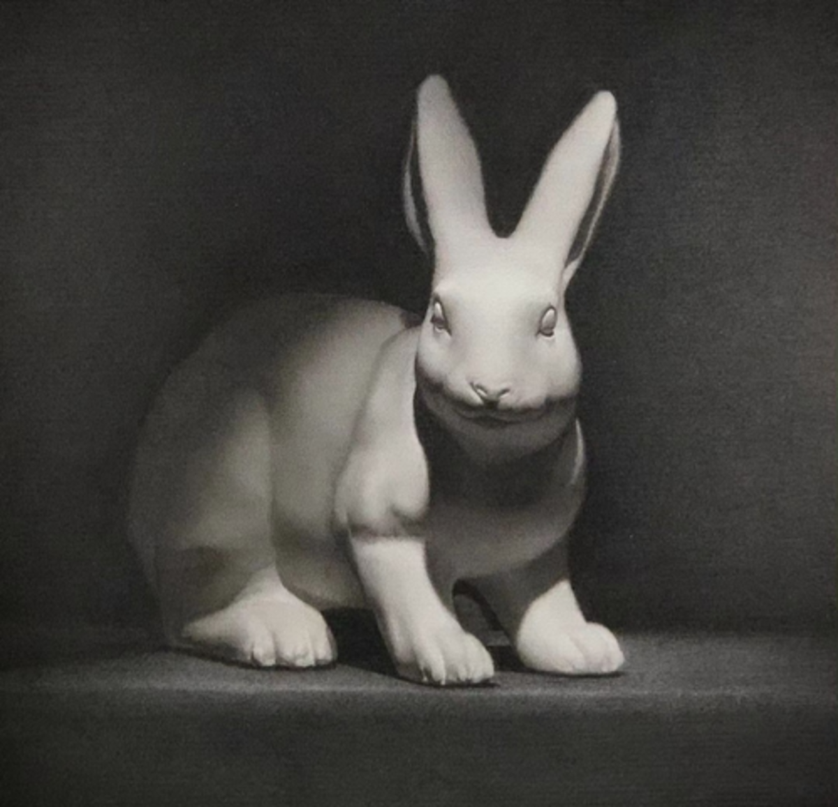 Black-and-white painting of a rabbit