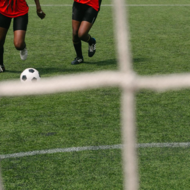 Players on the field playing soccer