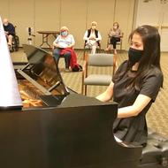 Photo of Opportunity Fund grantee Leona Cheung playing piano