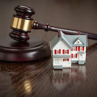 gavel with house
