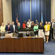 City Councilors pose with Dr. Albert Holland